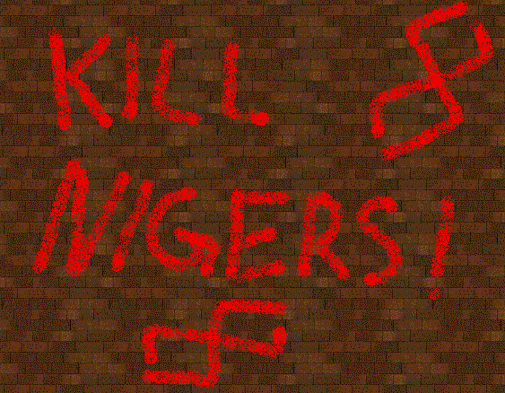 image. Brick wall with "kill nigers" (yes it's mispelled) and a couple of really screwed up swasticas spraypainted on it.
