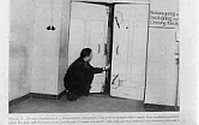 This was a double-door to a basement operating room in a German hospital to permit surgery during air raids. Peephole as required was right half of door. Were they planning to gas the patients--of course, NOT!